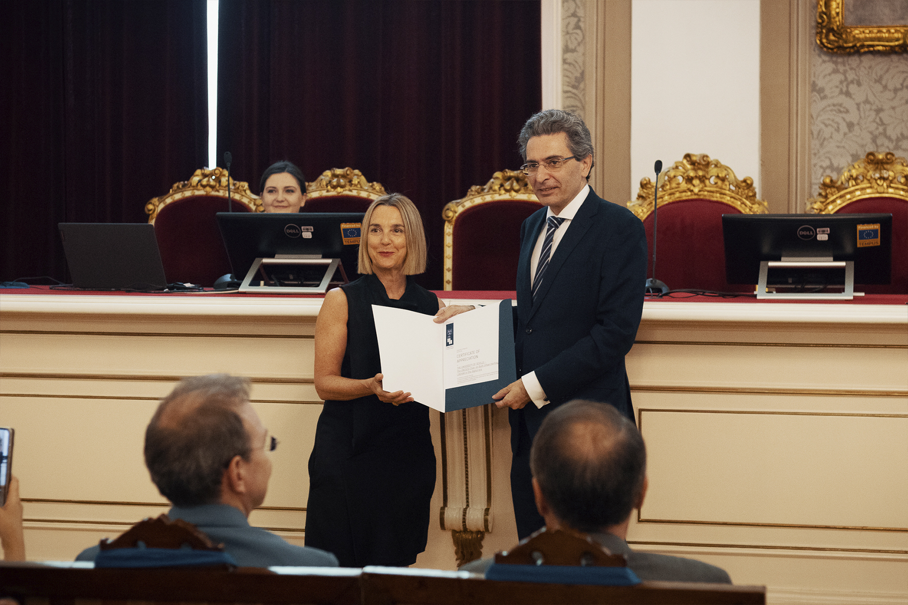 His excellency Raul Bartolome Molina, Ambassador of Spain in Serbia handing out the Certificate of Appreciation to the University of Seville from Spain, received by Prof. Dr. Mar Loren Mendez, Scientific Coordinator of HERSUS Project for University of Seville. © Marko Miladinović